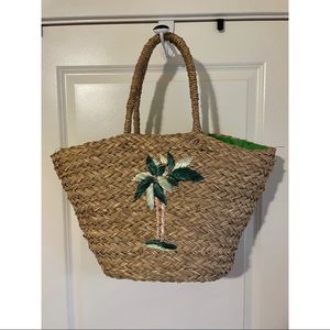 Woven beach bag with palm tree